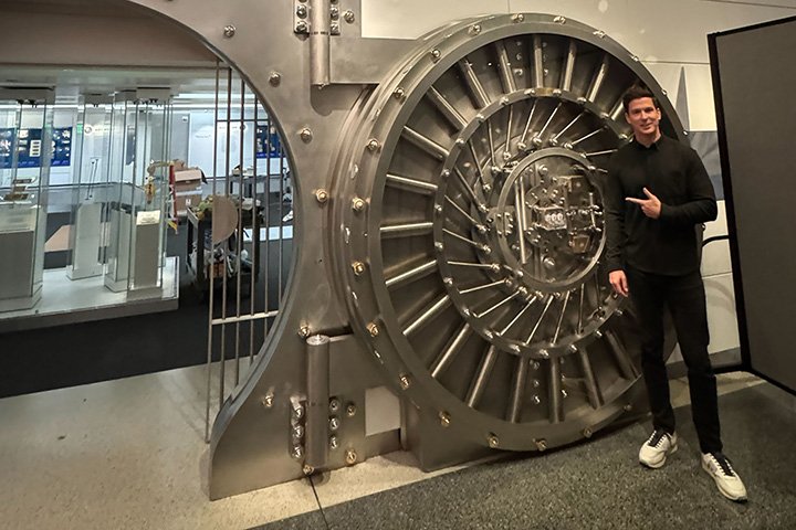 Chris Janczewski stands next the entrance to a museum exhibit at the Smithsonian Institute